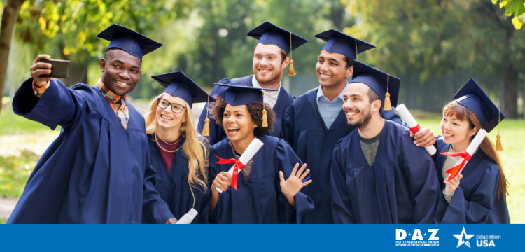 Alt text: Photo of a diverse group of happy students in graduation outfits celebrating the successful end of their studies in a park; logos for DAZ and EducationUSA appear in the bottom right corner.